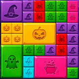 Spooky Halloween block puzzle with colorful witch, ghost, pumpkin, and cauldron shapes