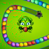 Colorful Zuma-style marble shooter with a frog aiming balls along a winding jungle path