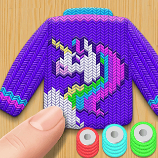 A threaded unicorn sweater with three woolen spools