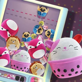 Adorable claw machine merging game with bouncing plushies